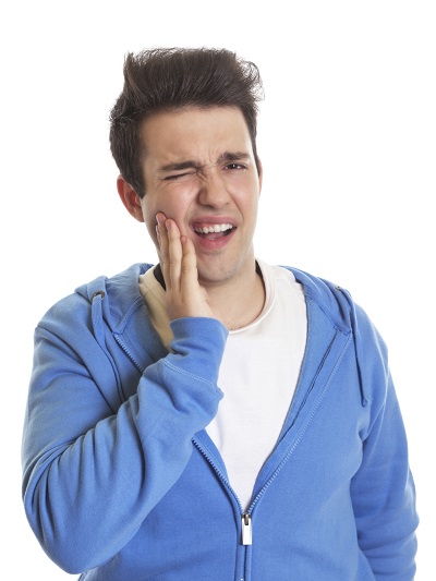 Man in pain because of sore gums looking for causes & treatment in South Ogden and Kaysville, UT
